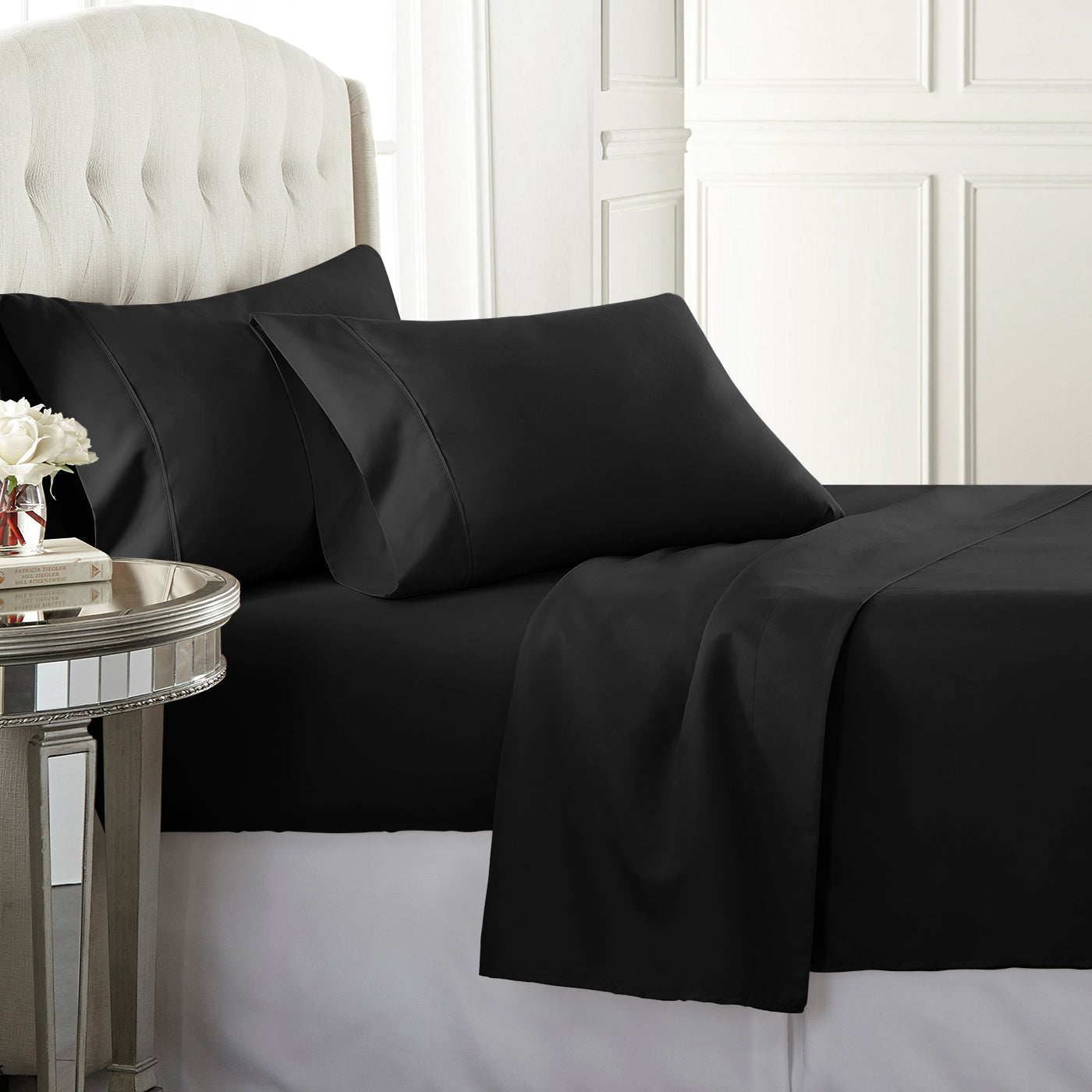 Black high-quality sateen sheet set with a 300 thread count, offering a rich, luxurious feel and durability.