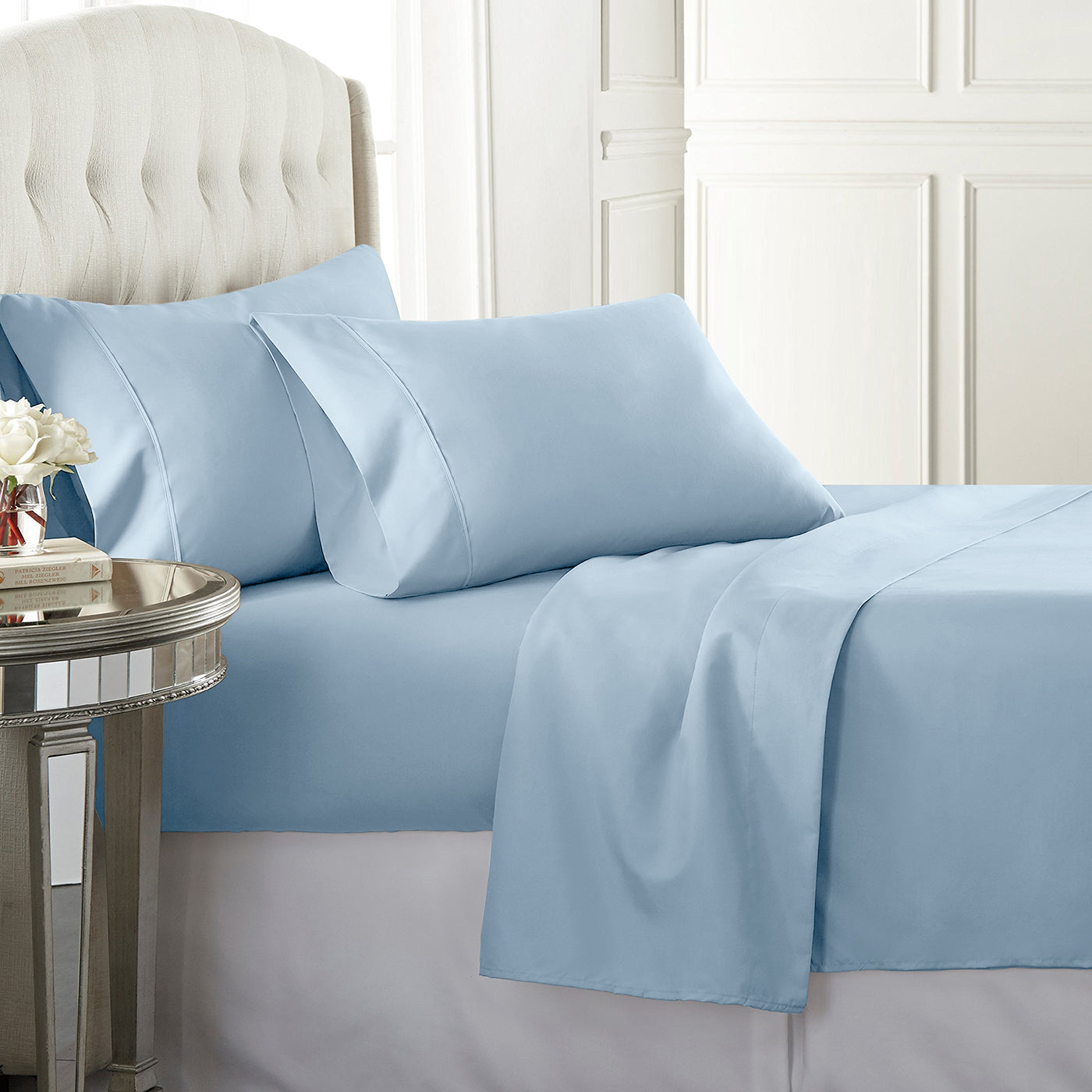 Blue high-quality sateen sheet set with a 300 thread count, offering a rich, luxurious feel and durability.