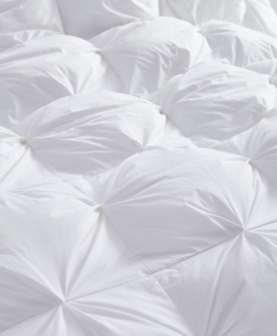 All-season luxury down comforter in white with a plush, warm feel, perfect for year-round comfort